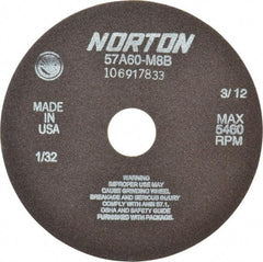 Norton - 7" 60 Grit Aluminum Oxide Cutoff Wheel - 1/32" Thick, 1-1/4" Arbor, 5,460 Max RPM, Use with Stationary Grinders - Eagle Tool & Supply