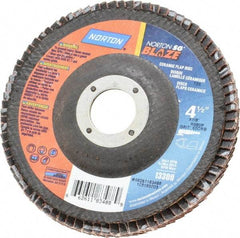 Norton - 60 Grit, 4-1/2" Disc Diam, 7/8" Center Hole, Type 29 Ceramic Flap Disc - 13,000 Max RPM, Fiberglass Backing, Arbor Attaching System, Coated - Eagle Tool & Supply