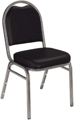 NPS - Vinyl Black Stacking Chair - Silver Frame, 18" Wide x 20" Deep x 34" High - Eagle Tool & Supply