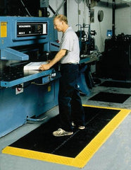 Notrax - 10' Long, Dry/Wet Environment, Anti-Fatigue Matting - Black with Yellow Borders, Vinyl with Vinyl Base, Beveled on 3 Sides - Eagle Tool & Supply