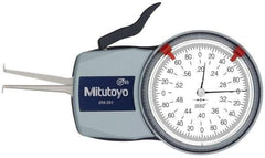 Mitutoyo - 0.2 to 0.6" Inside Dial Caliper Gage - 0.0002" Graduation, 0.0008" Accuracy, 1.37" Leg Length, 0.09" Deep x 0.032" Wide Groove, Ball Contact Points - Eagle Tool & Supply