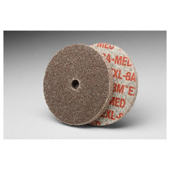 Scotch-Brite EXL Unitized Wheel XL-UW 8A Medium 3″ × 1/8″ × 3/8″ - Eagle Tool & Supply